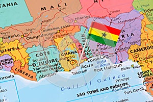 Ghana map and a flag pin