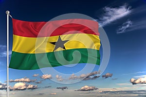 Ghana national flag waving in the wind against deep blue sky.  International relations concept