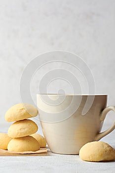 ghee biscuits or cookies with a tea cup