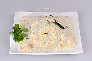 Ghee rice on white plate