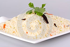 Ghee rice on white plate