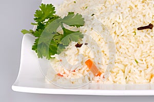 Ghee rice on white plate