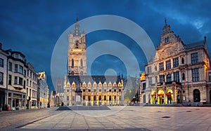 Ghent, Belgium. View of historic Town Hall and Belfry at dusk