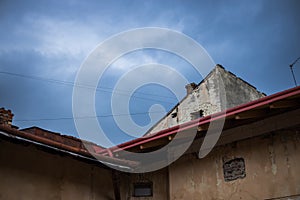Ghetto building slums backstreet construction frame in poor apartment living district roof object urban view in depressive mood