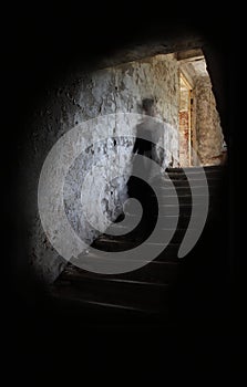 Ghost figure on stairs photo