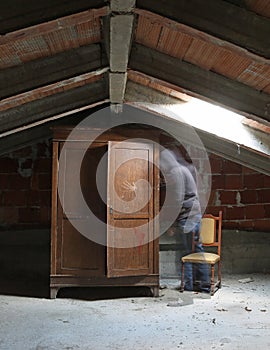 Ghost and an old wardrobe in the attic