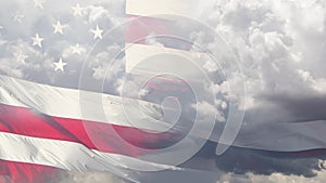 Ghosted American flag waving in wind with time-lapse clouds