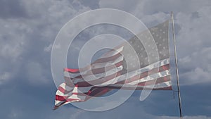 Ghosted Slow Motion American Flag Waving In Wind with Time-lapse Clouds