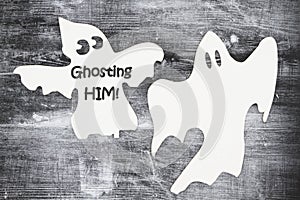 Ghosting someone message with two white ghosts