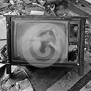 Ghostly figure on vintage tv set