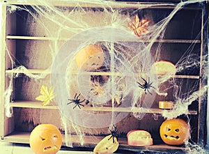 Ghostly Halloween background with spiders and webs
