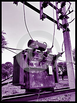 Ghosty Black and white image of electrical transformer.