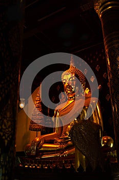 The giant ancient buddha statue in a church of Thailand