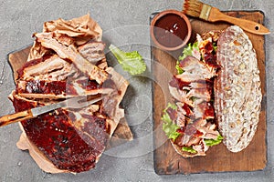 Giant BBQ rib sandwich on board