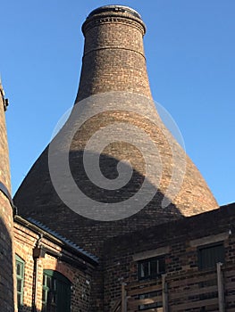 Giant brick kiln top part of the factory building photo