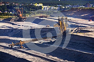 Giant bucket wheel excavator taking away the layers of ground