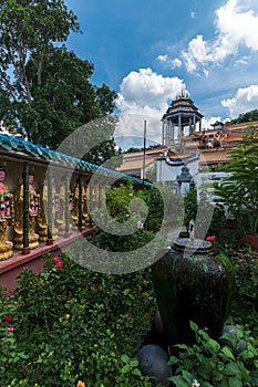 Giant Buddha in the garden located in the Kek Lok Si temple in Penang