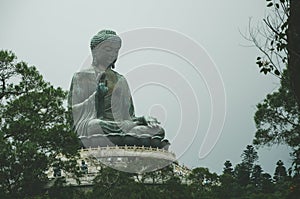 Giant Buddha Statue in Hong Kong, Lantau Island. Cloudy Day