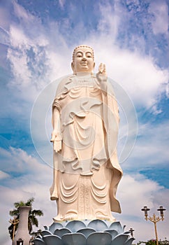 Giant Buddha statue in Vietnam with blue sky