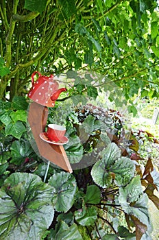 Giant ceramic teapot, cup and saucer garden ornament sculpture