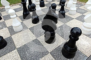 Giant chess on large chessboard