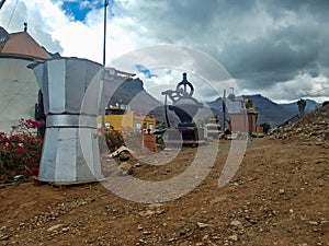 Giant coffee machines at the old wind mill Molino de Viento near Mogan, Gran Canaria island, Spain