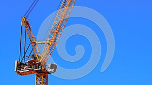 Giant crane with a clear blue sky