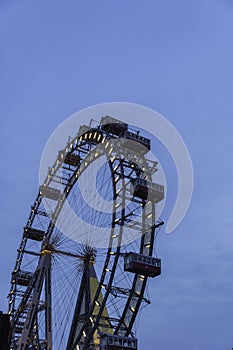 Giant ferris wheel against clear evening sky