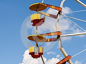 Giant Ferris Wheel In Fun Park On Blue Sky