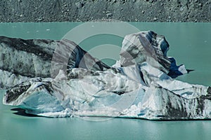 Giant floating icebergs on Tasman Glacier Lake in Aoraki Mount Cook National Park, South Island of New Zealand