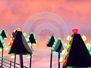 Giant fun slide at fairgrounds at sunset