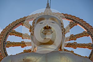 Giant and golden Big Buddha statue in Wat Phra Yai temple