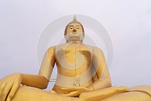 The Giant Golden Buddha in Wat Muang in Ang Thong district near Bangkok. Urban town city, Thailand