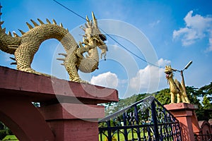 Giant golden dragon Statue at Rang ghar sibsagar assam, the royal sports-pavilion photo