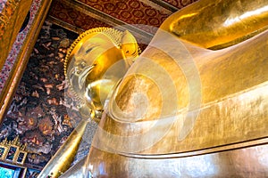 Giant golden reclining Buddha statue. Wat Pho temple