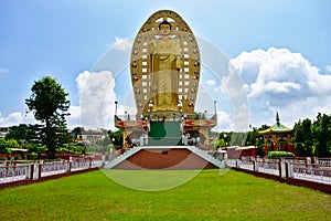 Giant golden statue of budha in india