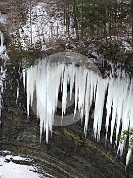 Gigantic gorge rock wall icicles Taughannock Falls State Park NYS photo
