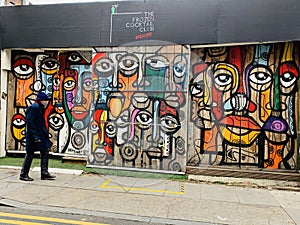 Giant graffiti art on the streets of Brick Lane, East London Uk