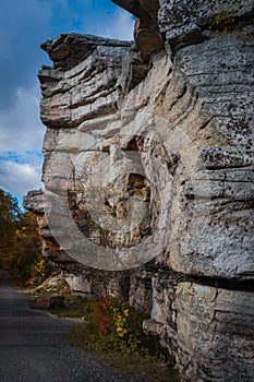 Giant granite outcropping foreground along hiking trail at Sam's Point Preserve