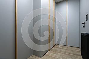 Giant gray closet on hallway