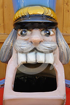 Giant head of nutcracker figure / sculpture with wide open mouth
