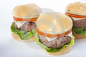 Giant homemade burger classic american cheeseburger isolated on