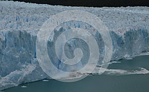 Giant iceberg breaking off glacier