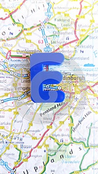 A giant letter E spelling Edinburgh on a map of Scotland