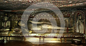 A giant lying Buddha statue in Cave Two Maharaja Viharaya at the Dambulla Cave Temples.