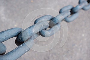 A giant metal chain. Links of an iron chain close up