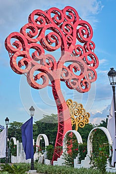 Giant metal red tree