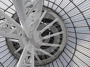 Giant metall colums holding a top of giant conic roof construction.