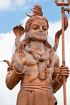Giant 33-meters Lord Shiva statue at Ganga Talao Grand Bassin Hindu temple, Mauritius.