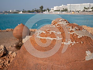 Giant old pots on Nissi beach in Ayia Napa, Cyprus. Delightful sea holidays